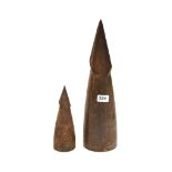 Two armour piercing artillery shell heads, tallest H. 42cm.