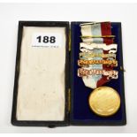 A 15ct gold outer cased Royal Masonic Institute medal.