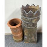 A large Victorian glazed ceramic chimney pot, H. 94cm, together with a further chimney pot.