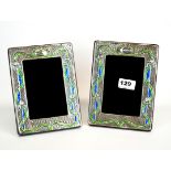 A pair of Art Nouveau style enamelled sterling silver photo frames, 15 x 19cm.