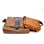 Two men's brown leather shoulder bags, widest W. 38cm.