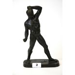 An early 20th century male bronze figure of an athlete. H. 27cm.