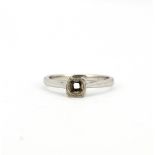 A white metal (tested high carat gold) ring mount,