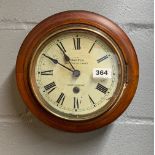A small 19th century mahogany framed shop clock by Griffin of Harringay, Dia. 27cm.