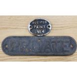 A cast iron "Private" sign and cast iron "Due for paint 1964" sign.