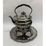 A silver plated spirit kettle with stand and tray.