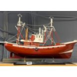 A wooden model of a fishing trawler, L. 58cm.