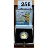 A boxed 2006 Britannia gold £10 coin.