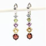 A pair of 925 silver drop earrings set with blue topaz, peridot, amethyst, citrines and garnets,