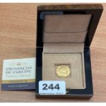 A cased gold 20 francs monarchs of Europe Napoleon III commemorative coin.
