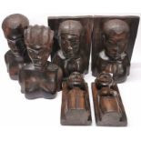 Two pairs of African carved figured ebony bookends with a pair of busts, tallest H. 23cm.