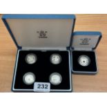 A cased group of 4 2004, 2005, 2006 and 2007 silver £1 proof coins with a further single 2006 £1