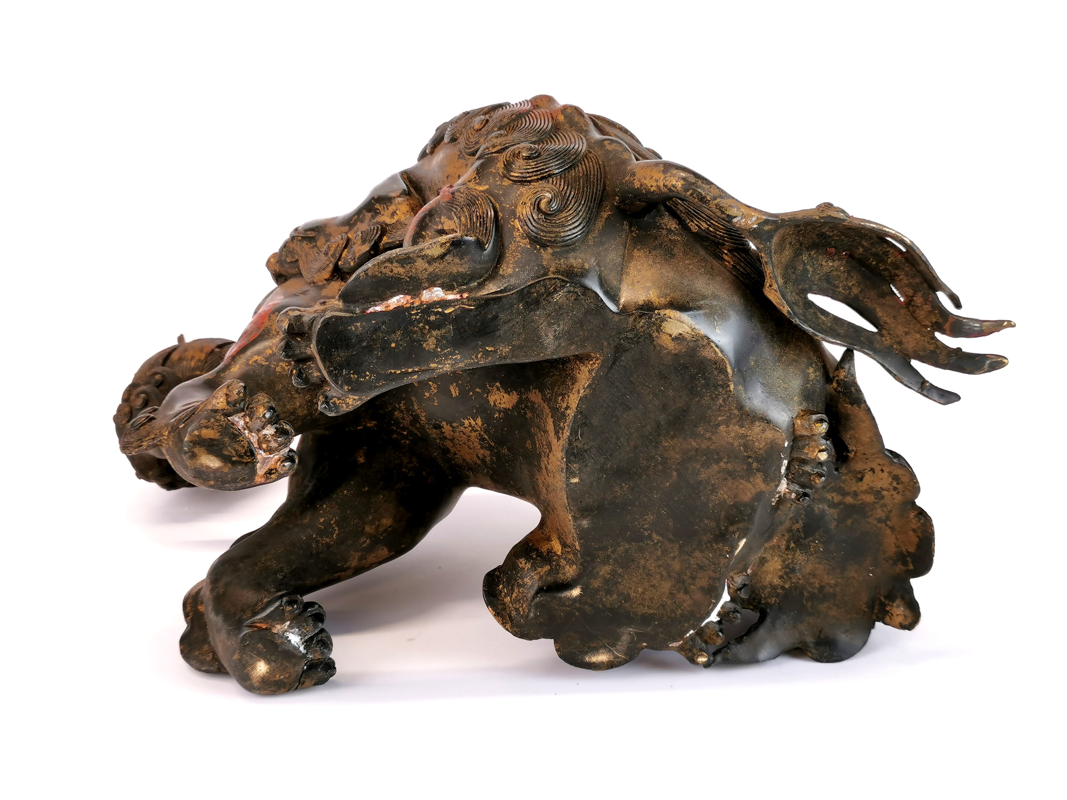 An unusual Chinese bronze model of two liondogs playing, one with removeable head, H. 21cm. - Image 4 of 4
