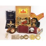 A group of Parachute Regiment badges and other related items.