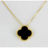 An 18ct yellow gold onyx set clover necklace, pendant length 1.5cm, chain 42cm.