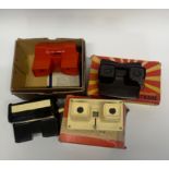 Four View master stereo viewers with some slides.