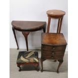An Edwardian inlaid plant stand with mahogany hall table, footstool and bedside cabinet.