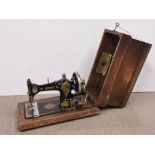 A vintage Jones hand operated sewing machine.