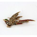 An antique rose metal (tested minimum 9ct gold) bird shaped brooch set with rose cut diamonds,