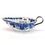 An 18thC Chinese export porcelain saucier, with an early replacement metal handle, L. 21cm. (