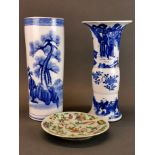 A Chinese hand painted porcelain vase, H. 30cm, together with a Chinese porcelain cylinder vase