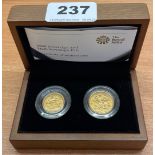 A boxed 1908 gold sovereign and half sovereign.