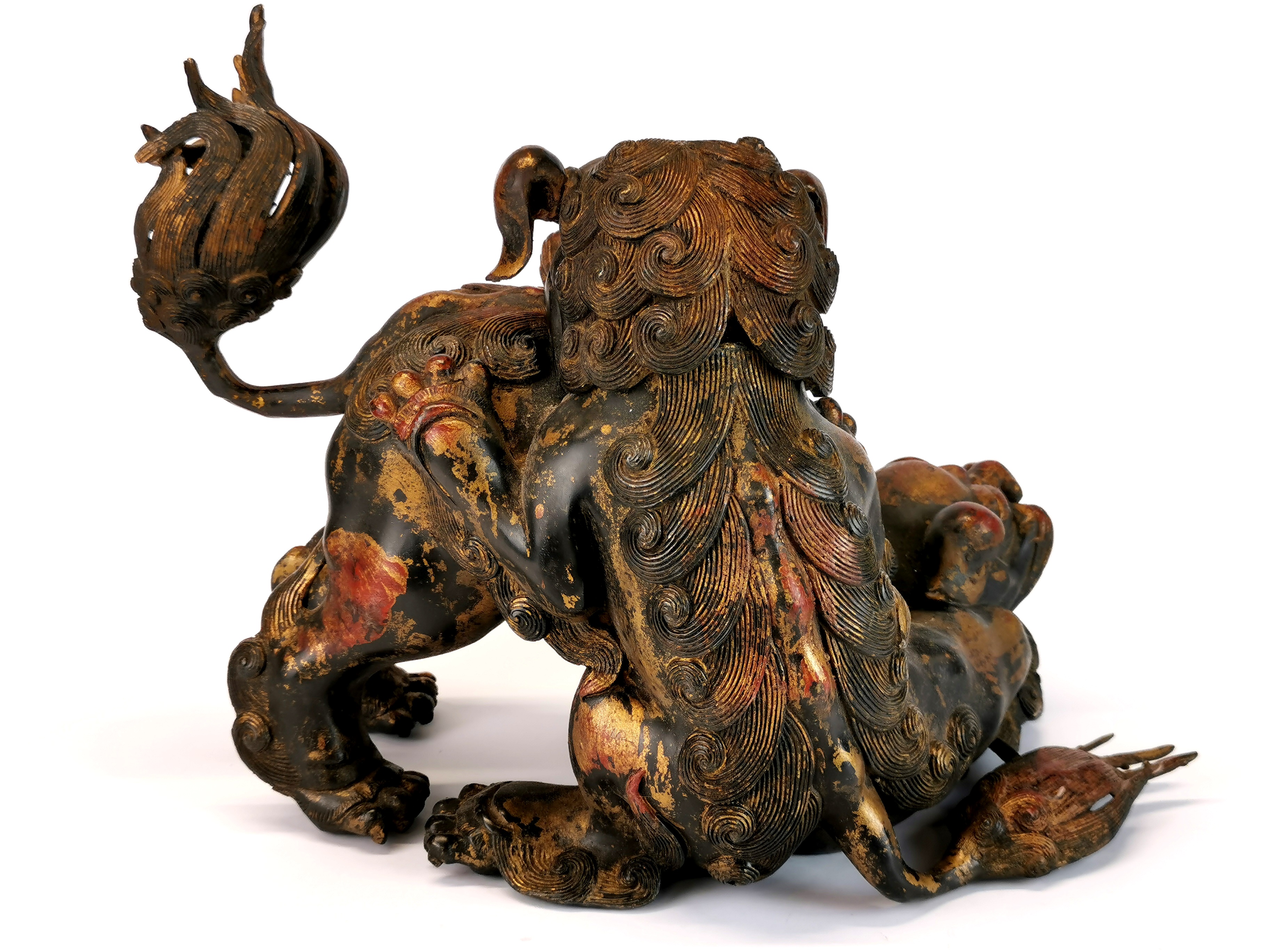 An unusual Chinese bronze model of two liondogs playing, one with removeable head, H. 21cm. - Image 3 of 4