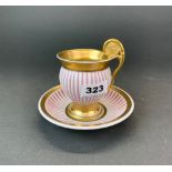 A Continental porcelain coffee cup.