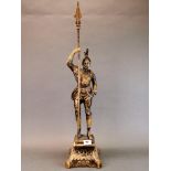 A large bronze/ brass figure of a pikeman, H. 80cm.