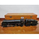 An 'O' gauge 74002 electric locomotive and tender.