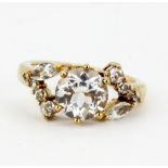 A 9ct yellow gold ring set with white topaz, (N).