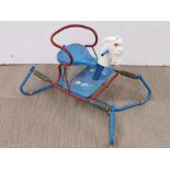 A vintage child's rocking horse toy.