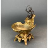 A bronze and gilt bronze cherub shell shaped bowl after E. Provost, H. 19cm.