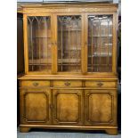 An attractive Regency style bookcase, W. 146cm, H. 194cm.