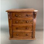 A small mahogany four drawer wellington chest, 42 x 43 x 32cm.