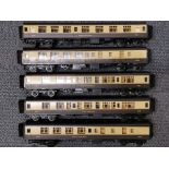 A group of 5 Great Eastern 'OO' gauge plastic railway carriages.