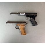 Two vintage air pistols.