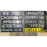 A group of 11 underground train front destination signs, 62 x 10cm.