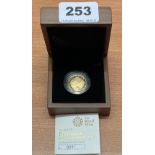 A 2010 Britannia gold £25 proof coin.