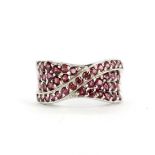 A 925 silver rodolite garnet pave set ring, (O).