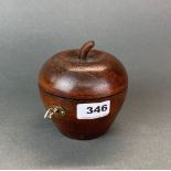 A carved wooden apple tea caddy, Dia. 11cm, D. 11cm.