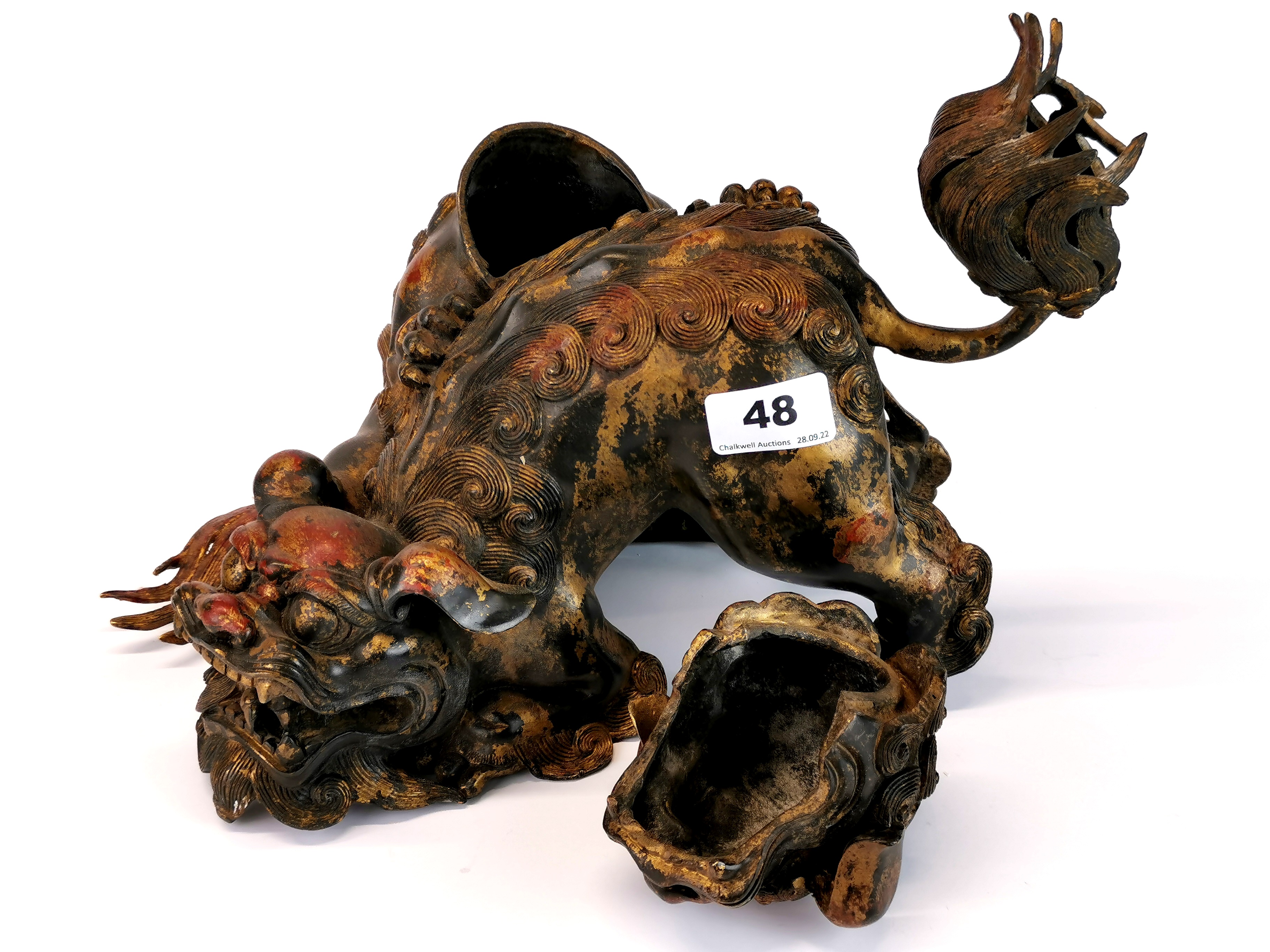 An unusual Chinese bronze model of two liondogs playing, one with removeable head, H. 21cm. - Image 2 of 4