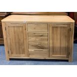 An attractive contemporary heavy quality oak sideboard, W. 140cm, H. 83cm.