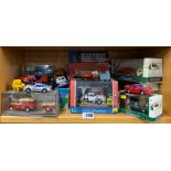 A group of mixed die cast model vehicles.