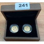 A boxed 1909 proof sovereign and half sovereign.