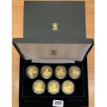 A 2007 boxed collection of silver gilt proof History of the Monarchy (Stuart Collection) £5 coins.