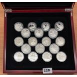 A boxed group of 18 2003, 2004 and 2005 £5 silver coins commemorating the history of the Royal