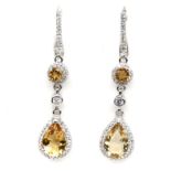 A pair of 925 silver drop earrings set with pear and round cut citrines and white stones, L. 5cm.