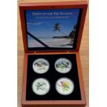 A silver proof coin set Birds of the Fiji Islands.