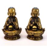 A pair of Chinese bronze/brass incense holders, H. 13cm.